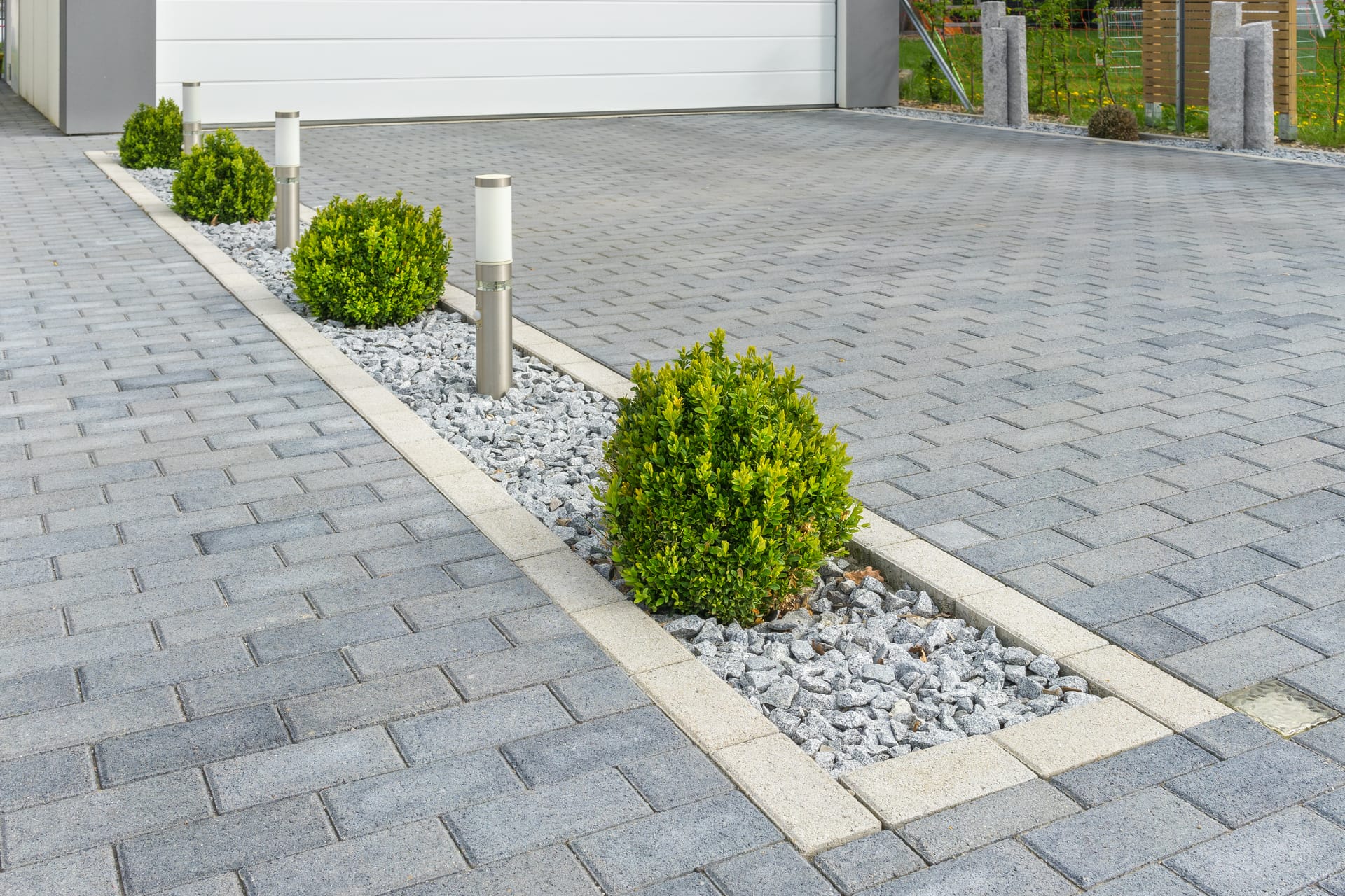 Smart Call Contractors laying a block paving driveway in Lincolnshire